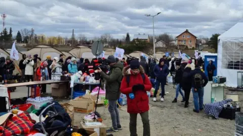 Paul Stratton Refugees at the border between Poland and Ukraine