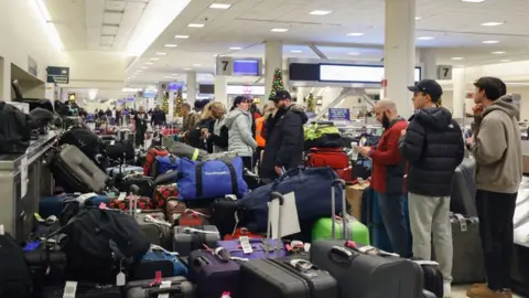 Getty Images Passengers stranded by Southwest Airlines cancellations