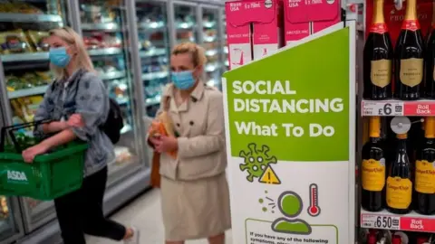 Getty Images shoppers with masks