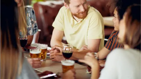 Getty Images Friends in pub