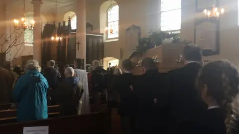 BBC Coffin being carried