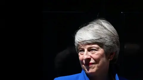 Reuters Theresa May