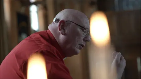 Jamie Niblock/BBC The Reverend Joe Adams