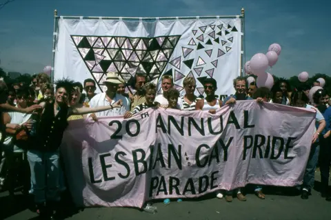 Gordon Rainsford Archive, Bishopsgate Institute People attend the Pride march in 1989