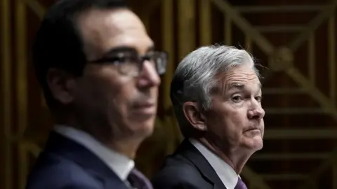 Reuters US Treasury Secretary Steven Mnuchin (L) and Federal Reserve Board Chairman Jerome Powell