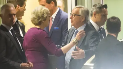 EPA British Prime Minister Theresa May with EU Commissioner President Jean-Claude Juncker at the end of a Brexit meeting in Brussels, Belgium, 16 October 2017