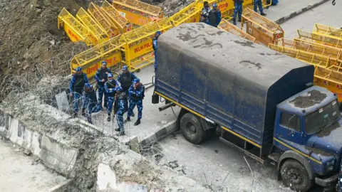 Getty Images Paramilitary personnel barricading one of Delhi's borders