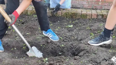 Cumbria Wildlife Trust Children from Brook Street School planting