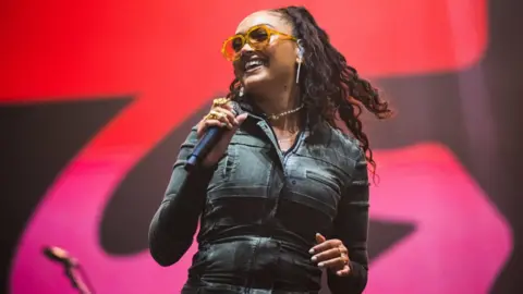 Getty Images Joy Crookes on stage at Radio 1's Big Weekend in Coventry