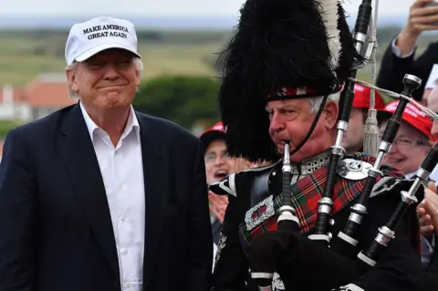 Getty Images Trump with Scottish bag pipes