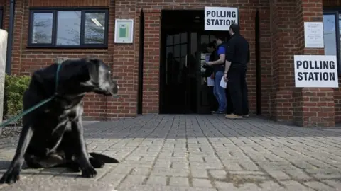 AFP A dog outside a polling station