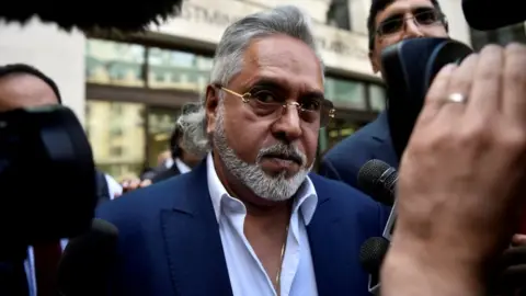Reuters Vijay Mallya leaves after an extradition hearing at Westminster Magistrates Court, in central London, on 13 June, 2017.