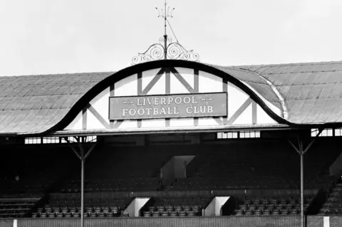 Liverpool FC The decorative gable at the centre of the main stand roof at Liverpool's Anfield stadium, designed by Archibald Leitch