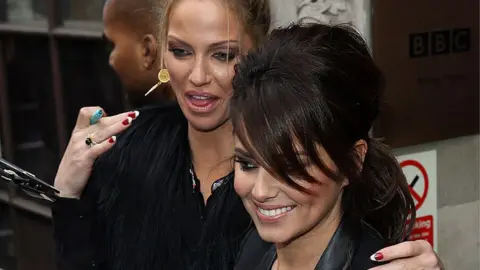 Cheryl Cole and Sarah Harding from Girls Aloud seen at BBC Radio One on November 12, 2012