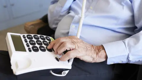 Getty Images man on phone