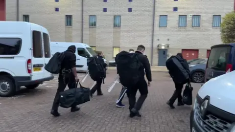 Officers at Harmondsworth immigration centre