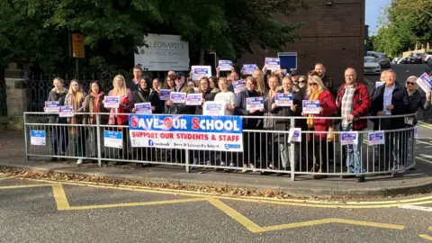 BBC People gathered outside St Leonard's Catholic School in Durham in an Raac protest