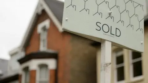 PA Sold sign next to house