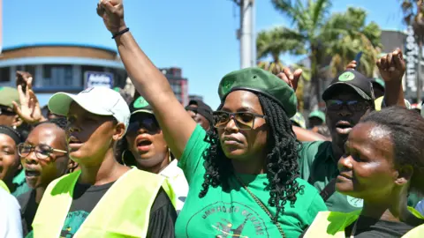 Getty Images MK party members march to Durban City Hall in South Africa - 1 March 2024