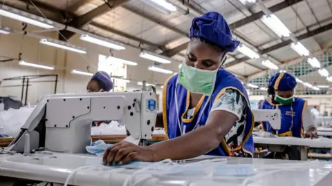 AFP A worker in Kitui, Kenya