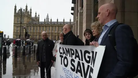 BBC Campaigners at Westminster protest about improving mental health services in Norfolk and Suffolk