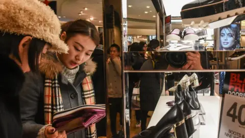 Getty Images Macy's shoppers