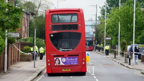 PA Media Buses abandoned in police cordon