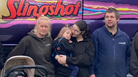 Denise Vaughan, Ellen-Mae holding Rosie, Alan Vaughan