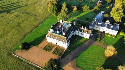 An aerial shot of Stapleford Park Hotel taken by a drone
