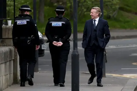 PA Craig Whyte arrives at the High Court in Glasgow