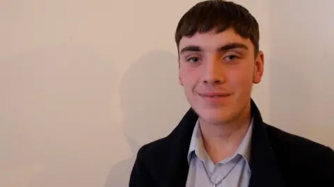 Winnie Ngai/BBC Issac, a young person who visits The Yard