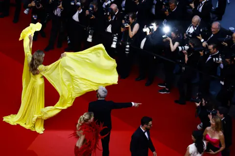 GONZALO FUENTES/Reuters The 76th Cannes Film Festival screening of the film "La passion de Dodin Bouffant", Red Carpet Arrivals - Cannes, France, May 24, 2023.