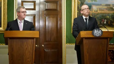 Niall Carson/PA Wire Sir Jeffrey Donaldson and Chris Heaton-Harris held a joint press conference at Hillsborough after the deal was published