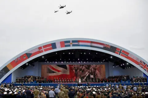 AFP Helicopters fly over the stage as Sheridan Smith sang