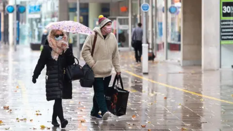 Getty Images people wearing masks