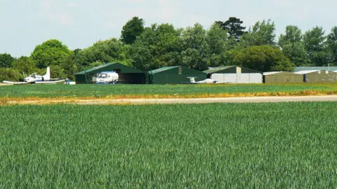 Geograph Airfield with parked gliders 