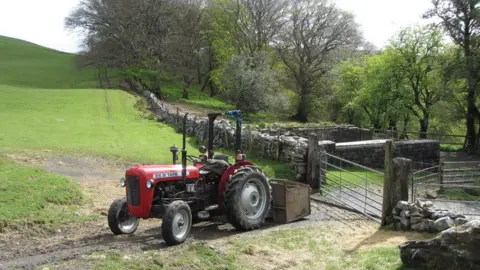 Gareth James/Geograph A tractor on Abercrave Woods, Powys