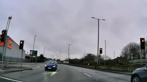 Handout A blue Skoda Fabia driving against the flow of traffic on the A61 road.