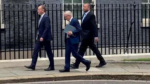 PA Media OBR members in Downing Street