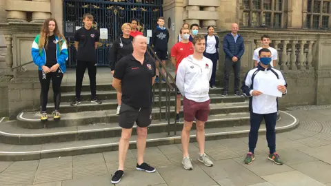 LDRS Swimmers protesting outside town hall