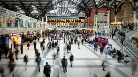 Getty Images Commuters at London Liverpool Street Station