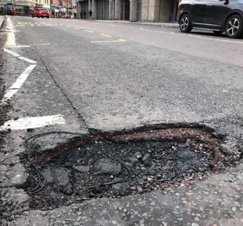 Dom Howell  Pothole in Partick, Glasgow