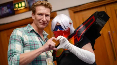 TFNation / Nick Hardy James Roberts and fan dressed as Rewind at TFNation 2017