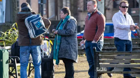 Athena Pictures Audrey Osborne, Clayton Moore, Ian Moore and Gary Moore outside court