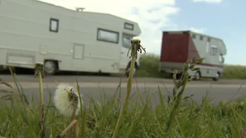 BBC Camper vans parked along a roadside