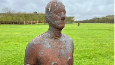 Shaun Whitmore/BBC Close up of an iron man created by Sir Antony Gormley