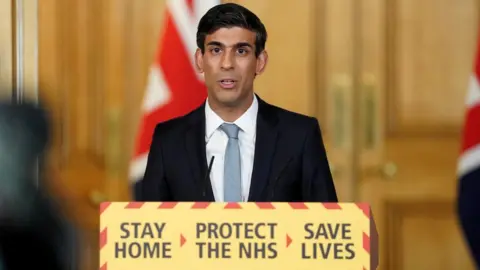 EPA Rishi Sunak addresses Downing Street briefing on 20 April 2020