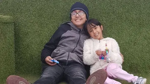 Macdonald Media Ahmar and his sister