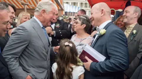 Arthur Edwards/The Sun/PA Wire Charles with couple