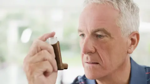 Getty Images Man with inhaler